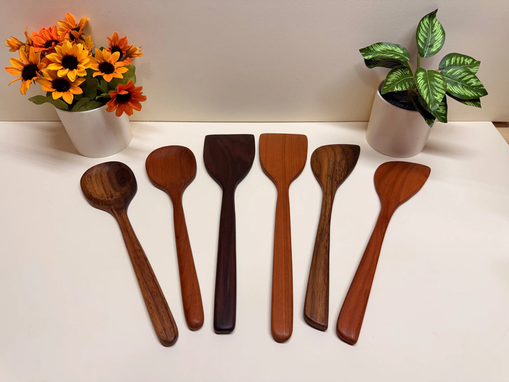 Handcrafted wooden kitchen utensil set in solid walnut or cherry, assorted spoon and spatula shapes