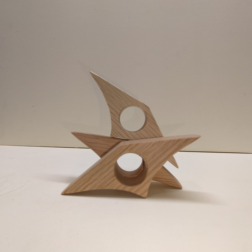 Red oak page holder set: three star-shaped pieces with round cutouts, light brown wood